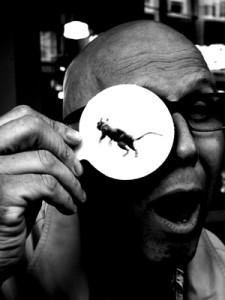 Josiane Keller - photographer with paper monocle and mange squirrel