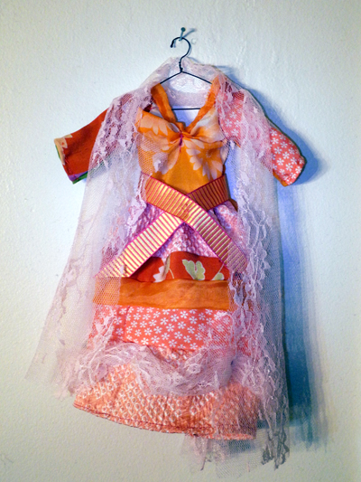 Josiane Keller - Vincent's orange Japanese silk dress and salmon lace veil
