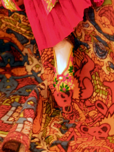 Josiane Keller - Laila's foot on the bed with traditional shoe