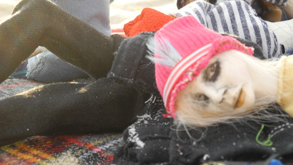 Josiane Keller - Chiaki on the beach wearing Larry's hat