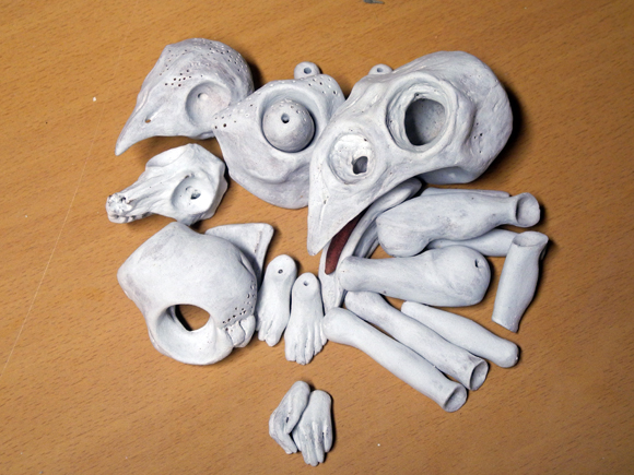 Josiane Keller - bird man and skulls post glaze